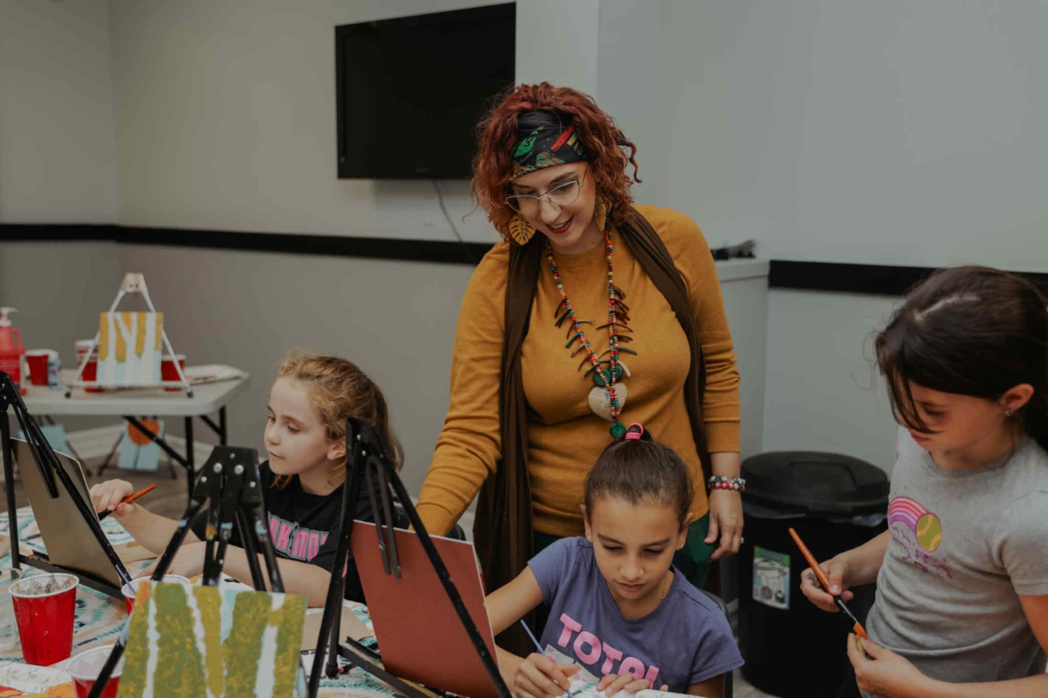 Instructor teaching an art class